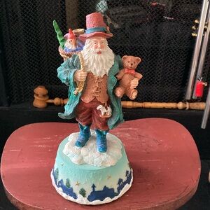 Vintage Santa music box plays "Santa Close coming to town.